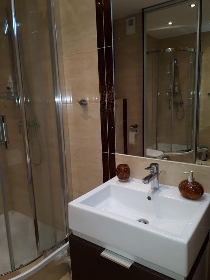 Apartament Galeria Warminska オルシュティン エクステリア 写真